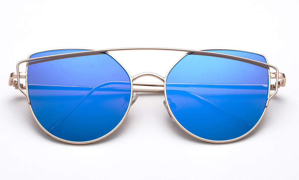 Modern Geometric Aviator Inspired Cat Eye Sunglasses with a Gold Metal Frame and UV 400 Protected Blue Flash Lens.