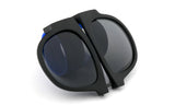 Trendy Folding Horned Rim Sunglasses with Colored Rubber Bendable Temples.