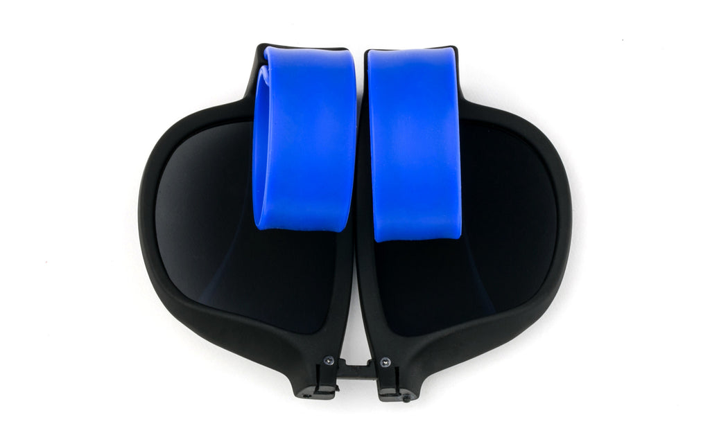 Trendy Folding Horned Rim Sunglasses with Colored Rubber Bendable Temples in Black and Blue.