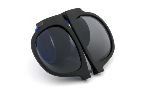 Trendy Folding Horned Rim Sunglasses with Colored Rubber Bendable Temples.