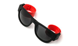 Trendy Folding Horned Rim Sunglasses with Colored Rubber Bendable Temples in Black and Red.